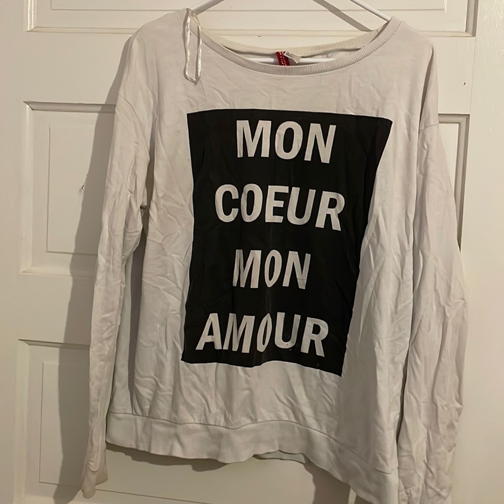 French saying sweater